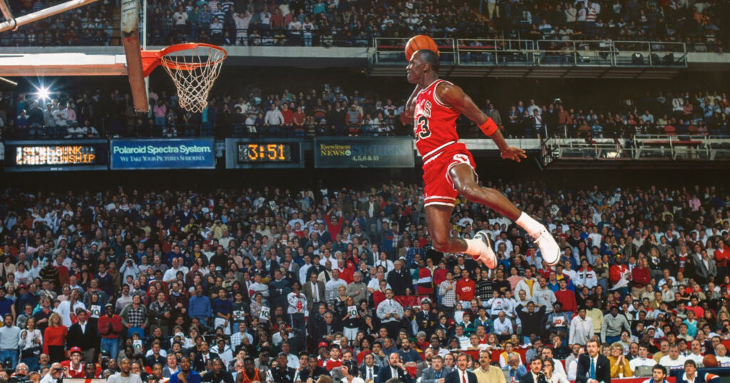 This photo shows Michael Jordan dunking - He has one of the highest vertical jump ever